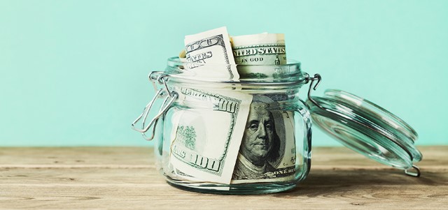 Dollar Bills in Glass Jar
