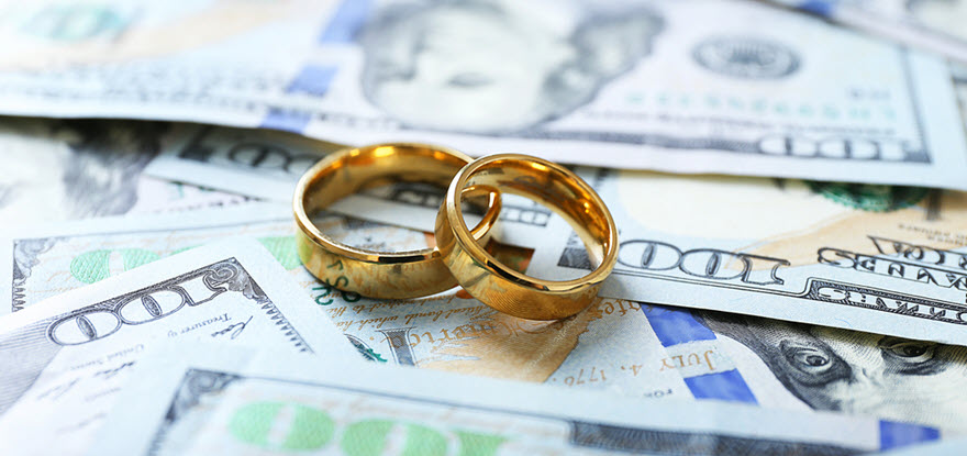 Wedding rings on money