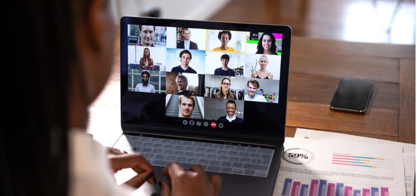 Woman Meeting Virtually with Co-Workers