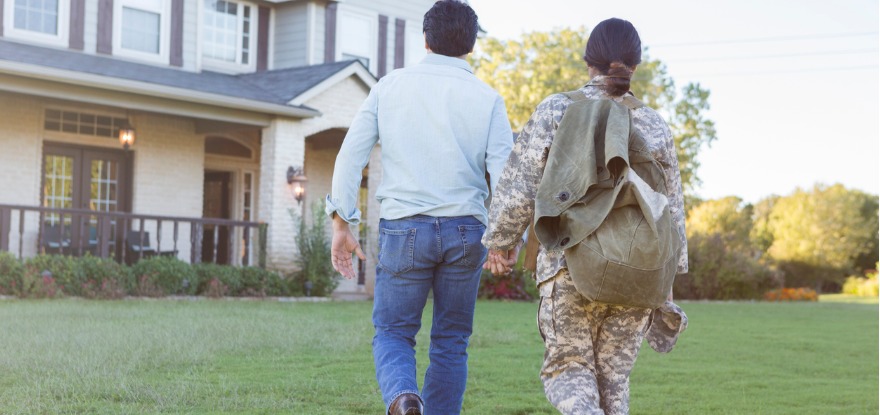 Husband leading returning military wife back home  ©iStockphoto.com/DI Productions