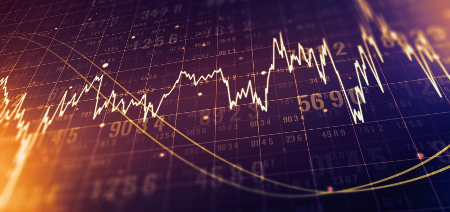 Macro view of a screen of trading terminal with abstract financial graph and digits