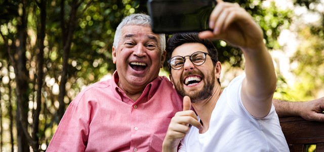 Dad-and-son-taking-selfie ©iStockphoto.com/filipefrazao