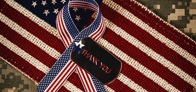 Veterans Day in America. American flag with dog tags Veterans Day in America. American flag with dog tags